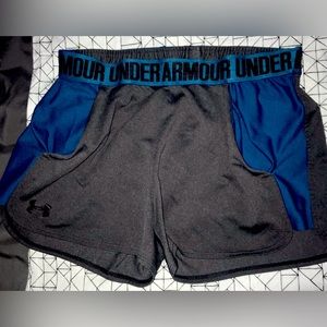 Upgrade your sporty wardrobe with these women's Under Armour active shorts.